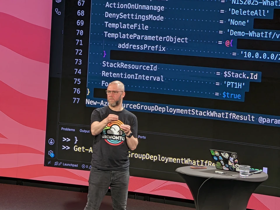 Simon from Unwonted presenting Azure and Bicep on stage at a community conference.
